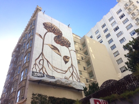 Muralist Makes Golden Brains Bloom On Tenderloin Hotel