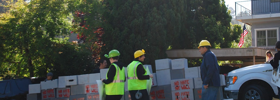 Protesters Build Mock Border Wall Outside Contractor's Montclair Home