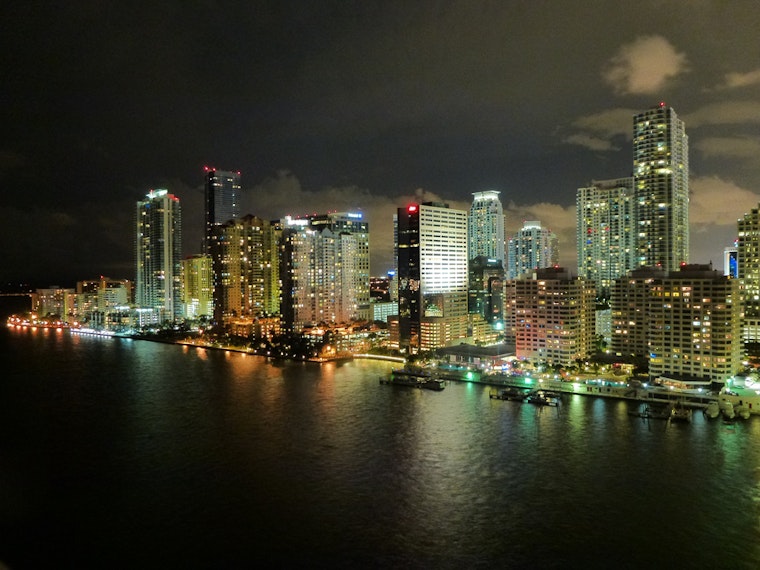Top Miami news: 2 shot while driving; bank deploys child-size greeter robot; more