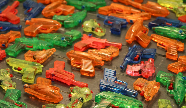 Top Atlanta news: Water gun fight soaks cops; Carter gets Emory tenure at 94; more