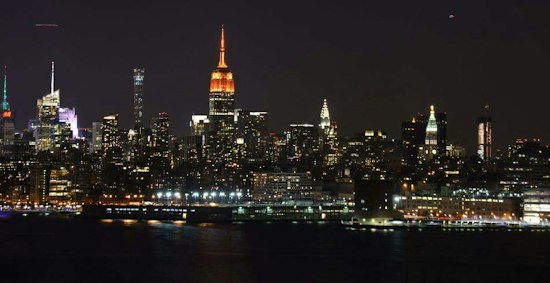 Right now, the Empire State Building is Lighting Up in Red and Gold