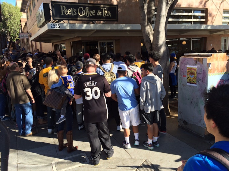 Warriors star Draymond Green serves coffee at Berkeley Peet's Coffee