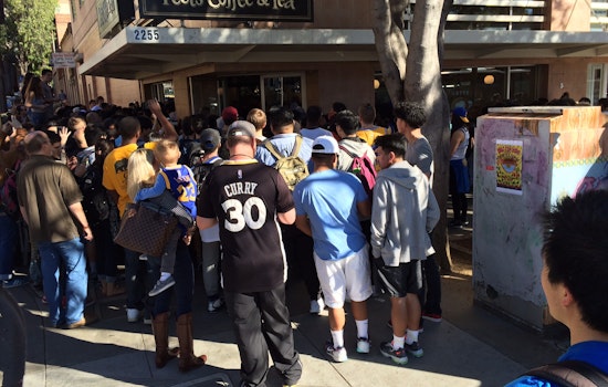 Warriors star Draymond Green serves coffee at Berkeley Peet's Coffee