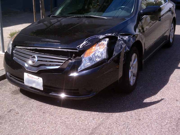 Hit and Run Driver Smashes Car on Waller, Leaves Fake Note