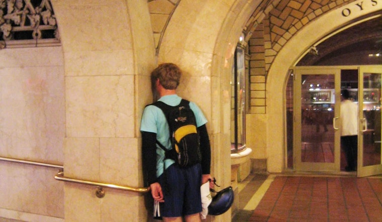 Why is this Man Talking to a Wall?