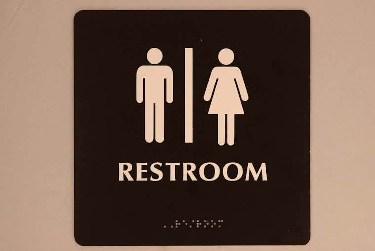 Top Baltimore news: Mayor signs gender-inclusive restroom bill; man charged with impersonating cop
