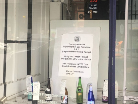 True Sake window sign blasts SF meter maids, offers discounted sake with a parking ticket