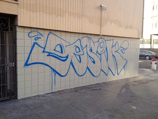 Leafy Mural Tagged, Painted Over, Tagged Again