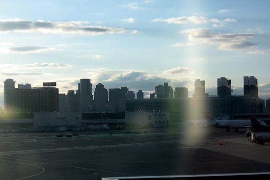 Top Boston news: Fire forces flight's return, evacuation of 217 passengers; man, child shot; more