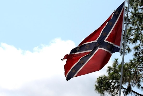 Top Chicago news: Chicago draws downstate ire in fair flag flap; alligator hunt continues; more