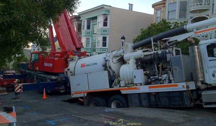 Sinkhole Nearly Swallows Truck on Waller Street