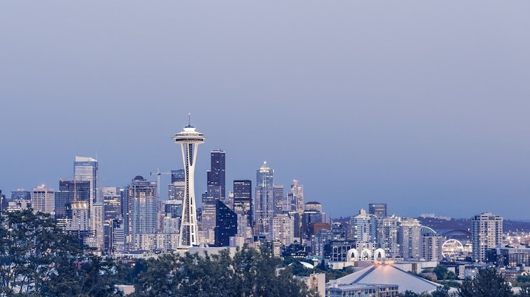 Top Seattle news: Rappelling for a good cause; poster encourages residents to report homeless; more