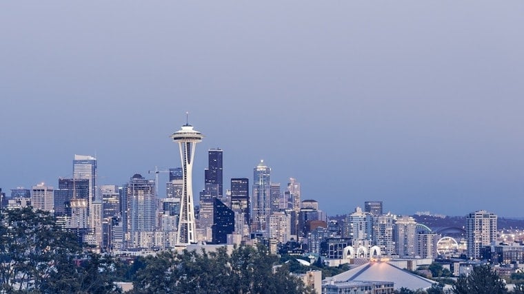 Top Seattle news: Rappelling for a good cause; poster encourages residents to report homeless; more