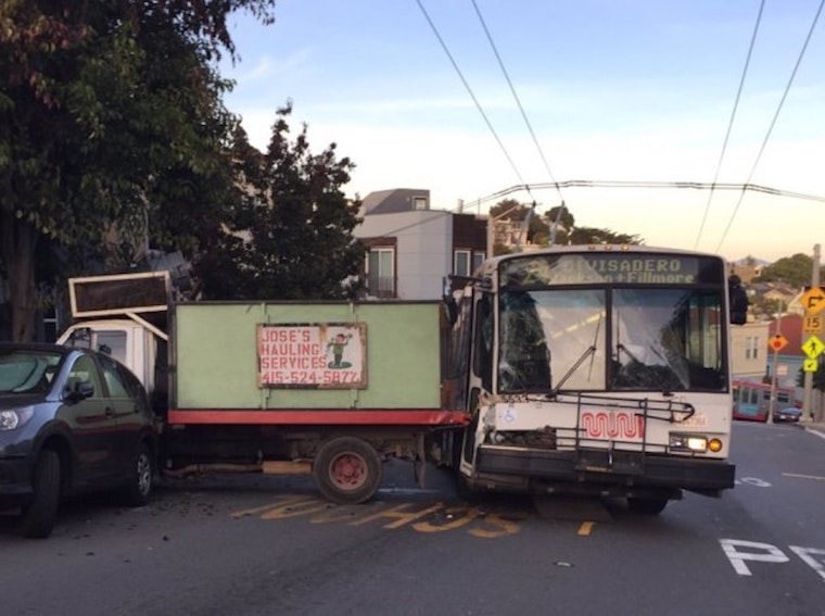 Muni Bus Collides With Truck In Bernal Heights