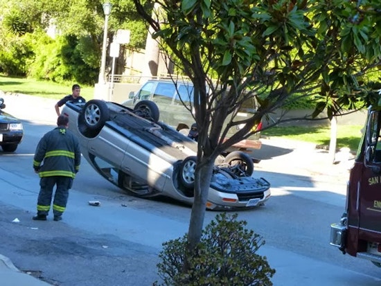 Breaking: Car Flips On Scott Street