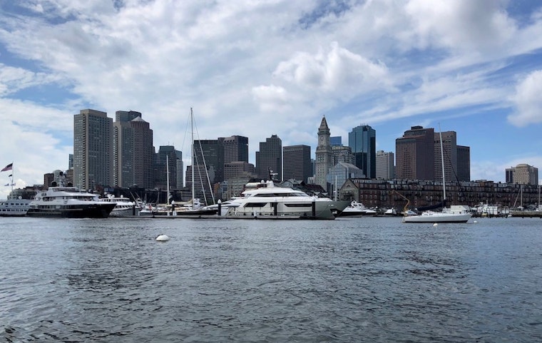 Top Boston news: Travolta meets fans at expo; rally urges stricter gun laws; air team flyover today