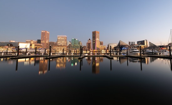 Top Baltimore community news: Boxing champ hosts backpack giveaway; public housing gets recycling