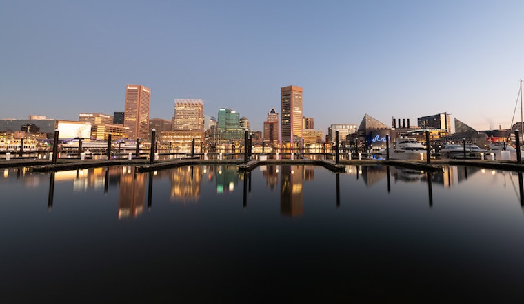 Top Baltimore community news: Boxing champ hosts backpack giveaway; public housing gets recycling