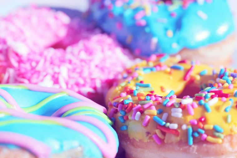 Top Denver news: Officer seriously injured in crash; doughnut shop helps local organizations; more