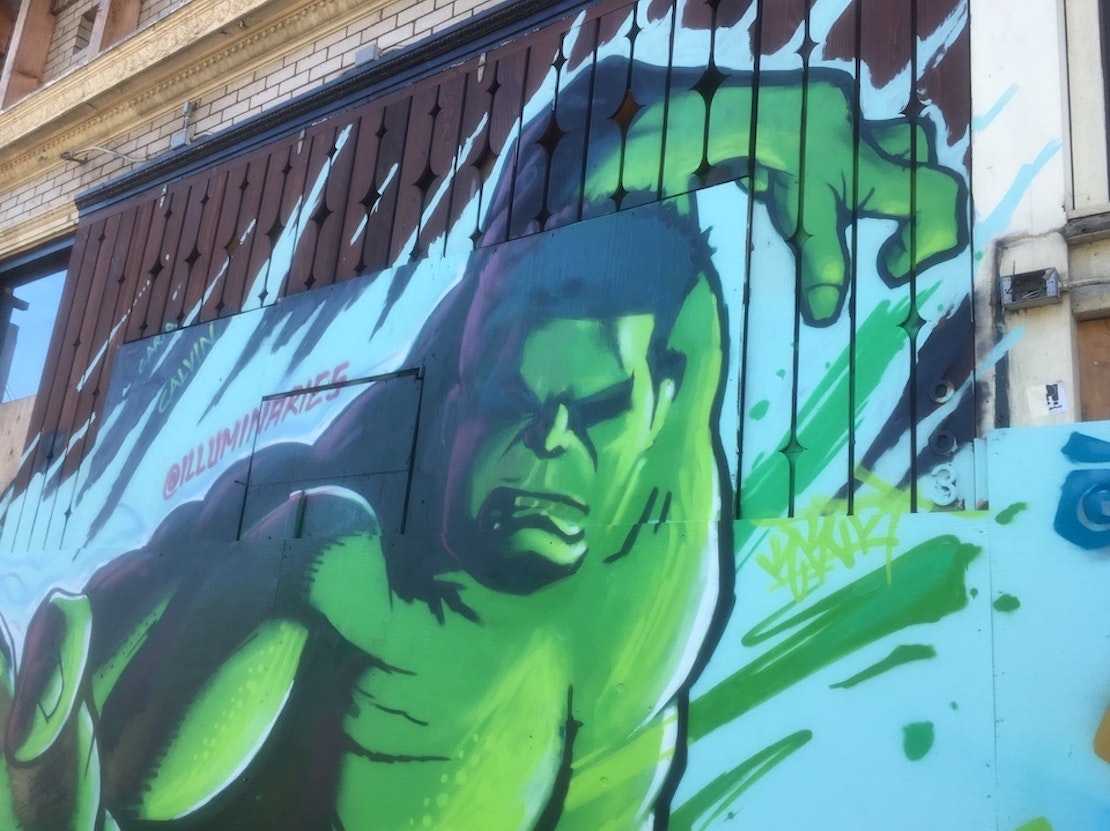 Graffiti murals of Marvel heroes revive North Beach building destroyed by fire