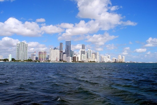 Top Miami news: Fire Rescue lifeguards help triathletes; woman's gunfire halts robbery; more