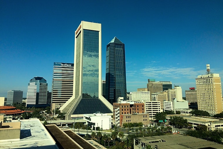 Top Jacksonville news: Man dragged behind van 'fighting for life'; murder suspect sought; more