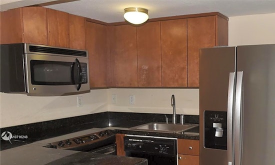 What apartments will $1,200 rent you in Overtown, this month?