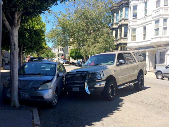 Two Parked Cars Damaged In Scott Street Accident