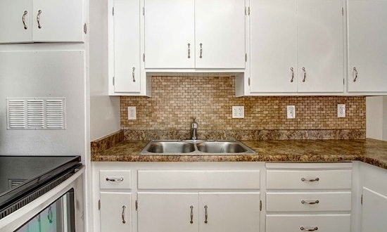 What apartments will $1,100 rent you in Alhambra this month?
