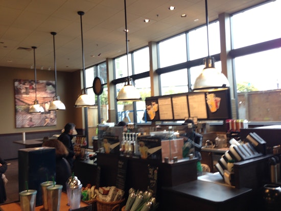 Irony: Expanded Starbucks in Safeway opens, Industrialists closes