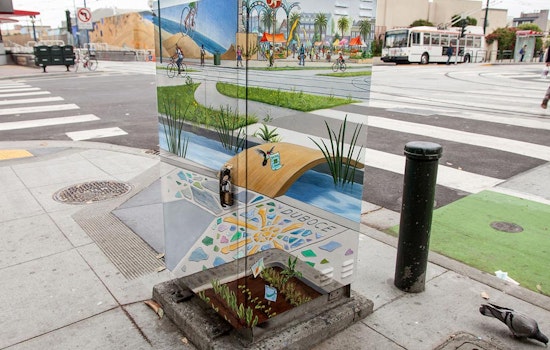 PHOTO: Mona Caron beautifies utility box at Duboce & Church