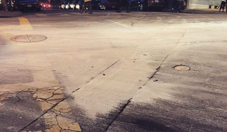 Saturday Oil Spill On Oak Street Prompts Street Dusting