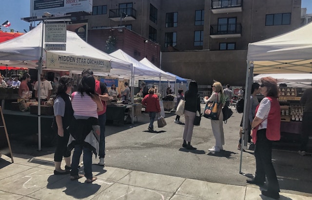 Tractor, pull: revived farmers market hopes to lure locals back