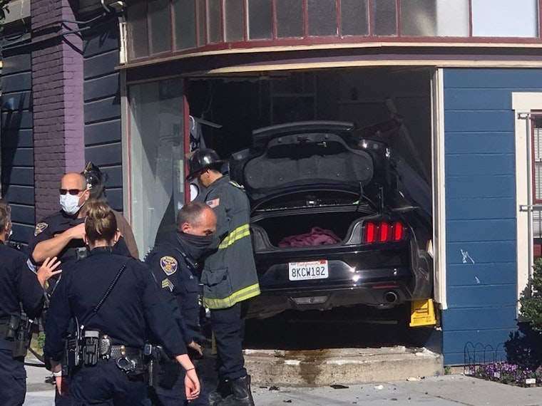 Driver sends vehicle through window of NoPa home in two-car collision