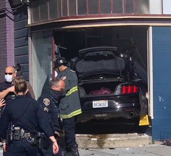 Driver sends vehicle through window of NoPa home in two-car collision