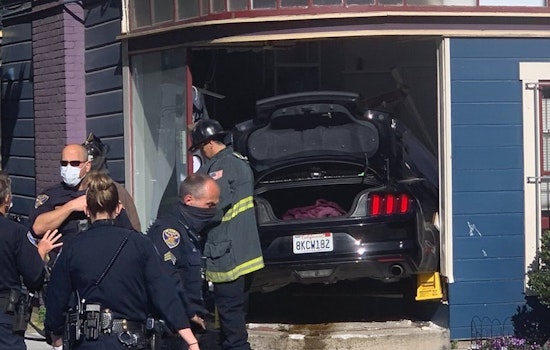 Driver sends vehicle through window of NoPa home in two-car collision