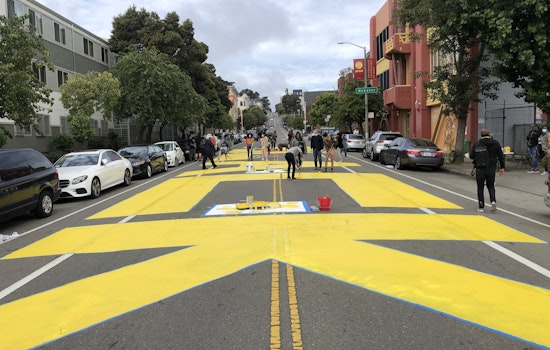 100+ volunteers paint 'Black Lives Matter' in center of San Francisco street