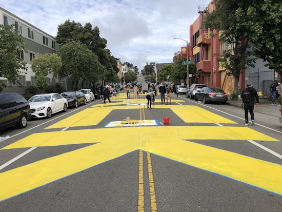 100+ volunteers paint 'Black Lives Matter' in center of San Francisco street