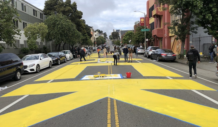 100+ volunteers paint 'Black Lives Matter' in center of San Francisco street