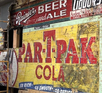 Construction crew discovers historic advertising behind facade at Duboce Park