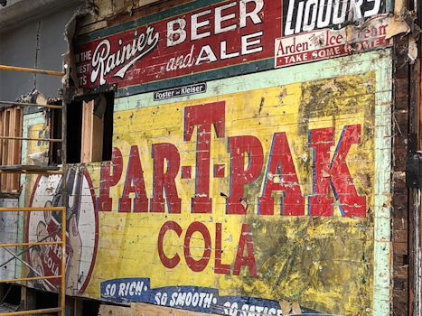 Construction crew discovers historic advertising behind facade at Duboce Park