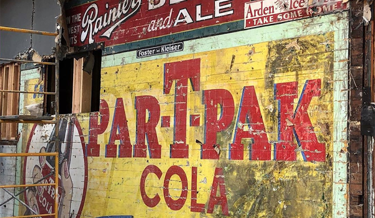 Construction crew discovers historic advertising behind facade at Duboce Park