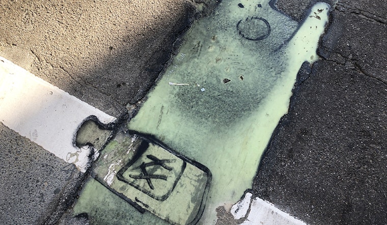 'The slime is art now': Mysterious green substance covers street at Page & Shrader