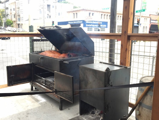 Photo: Whole Hog Smoking At 4505 Burgers & BBQ
