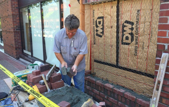 Photo: Bricklayer Tom Peyton Makes Repairs At 750 Battery