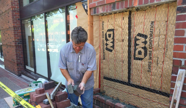 Photo: Bricklayer Tom Peyton Makes Repairs At 750 Battery